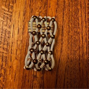 Vintage gold-toned and whitish-gray mesh magnetic costume jewelry bracelet